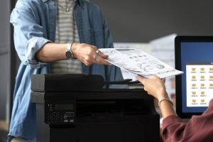 women-holding-paper-side-view women-holding-paper-side-view